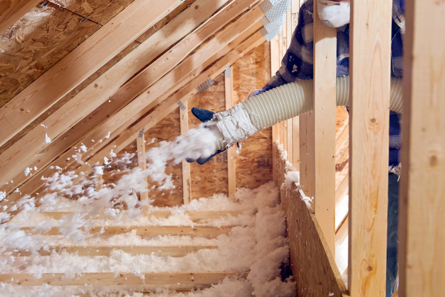 Metal building insulated with spray foam